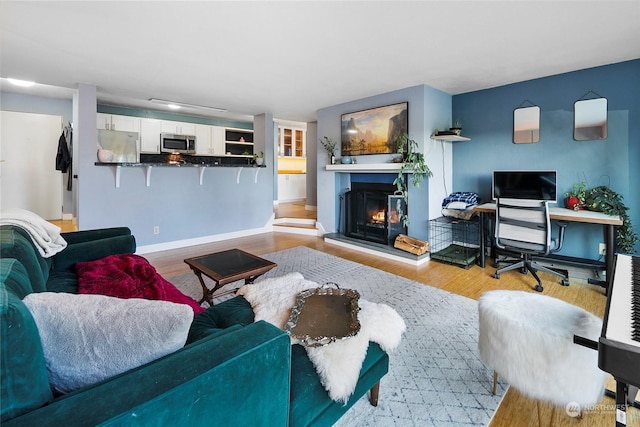 living room featuring light wood-type flooring