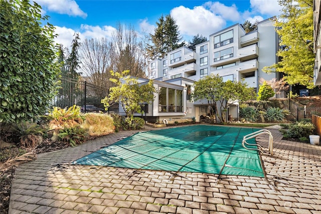 view of pool featuring a patio area