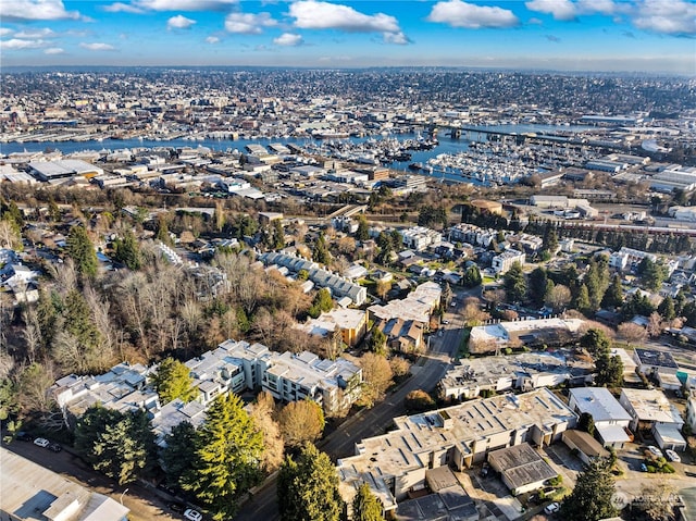 birds eye view of property featuring a water view