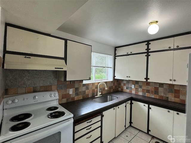 kitchen featuring sink, white cabinets, backsplash, white electric range oven, and light tile patterned floors