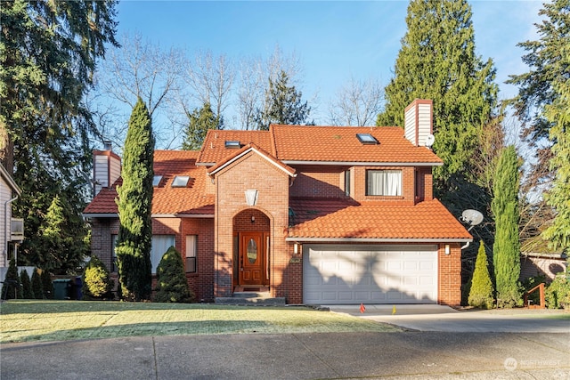 view of front of property with a garage