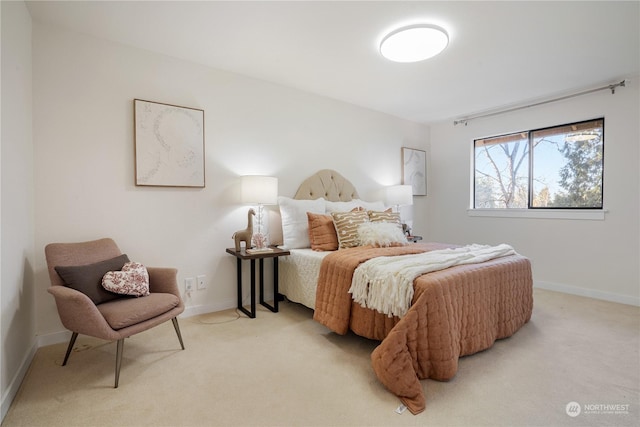 bedroom with light carpet