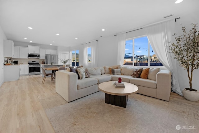 living room featuring light hardwood / wood-style flooring