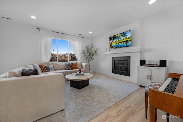 living room featuring light hardwood / wood-style flooring