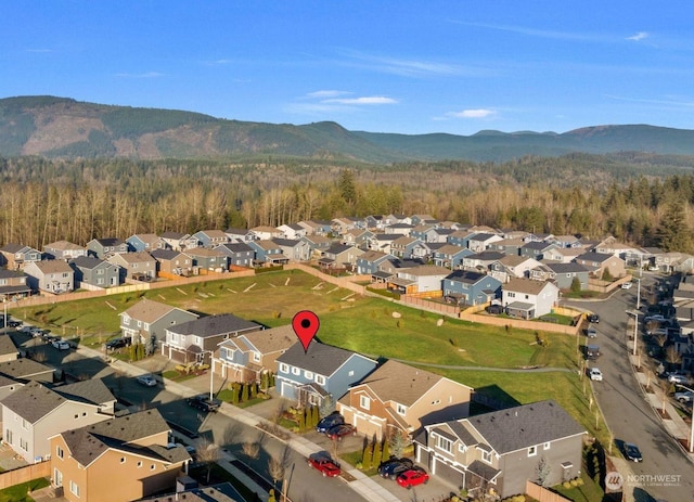 bird's eye view with a mountain view