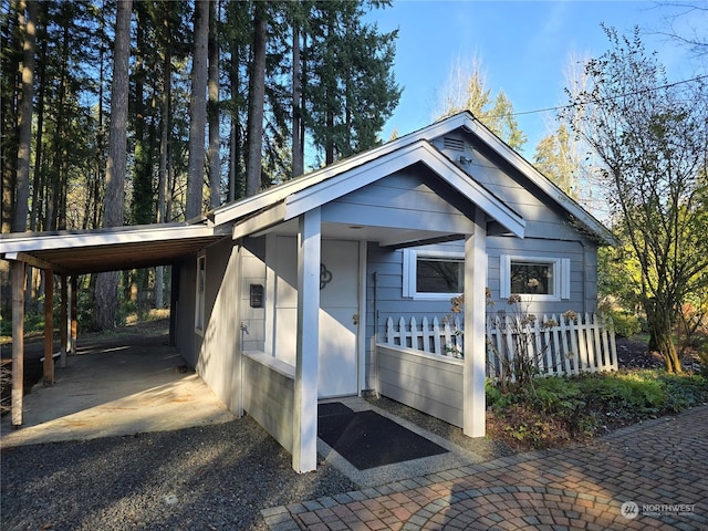 view of front of house featuring a carport