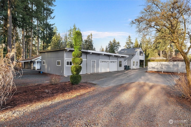 view of property exterior featuring a garage