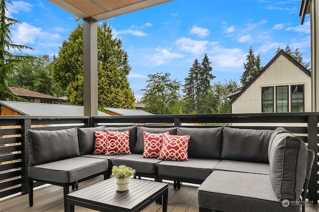 wooden deck featuring an outdoor living space