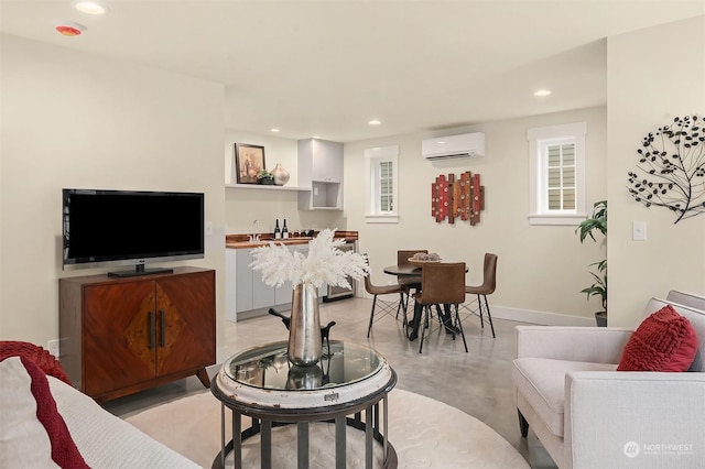 living room with an AC wall unit