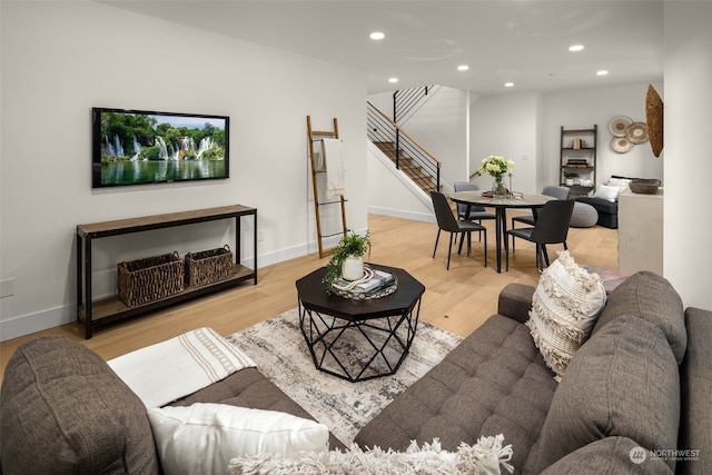 living room with light hardwood / wood-style floors