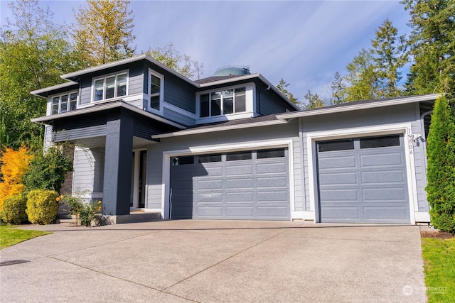 view of front of property with a garage