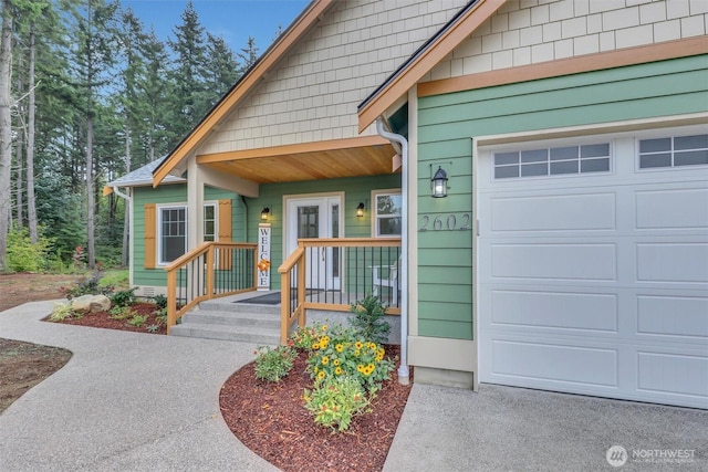 doorway to property featuring a garage