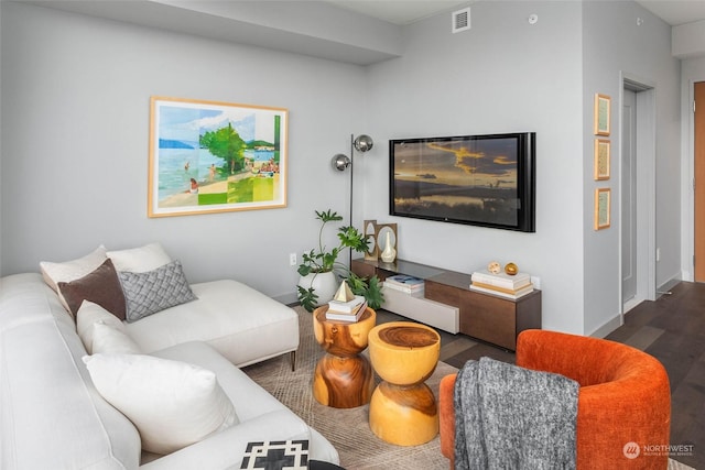 living room with dark hardwood / wood-style floors