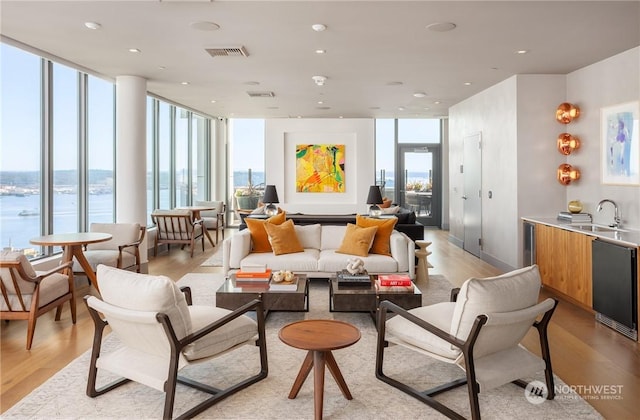 common area featuring sink and a water view