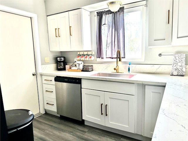 kitchen featuring dark hardwood / wood-style floors, sink, white cabinets, and dishwasher