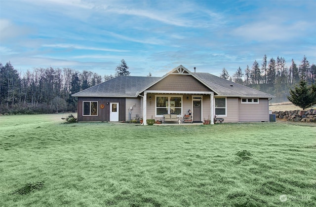 view of front of property with a front lawn