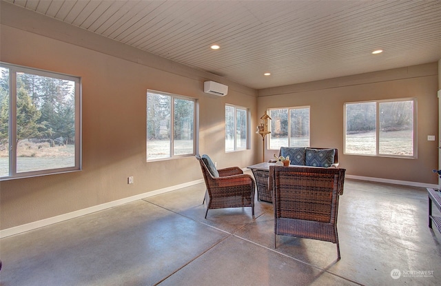 office area featuring plenty of natural light and a wall mounted AC