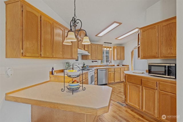 kitchen with light hardwood / wood-style flooring, dishwasher, decorative light fixtures, sink, and white range with electric stovetop