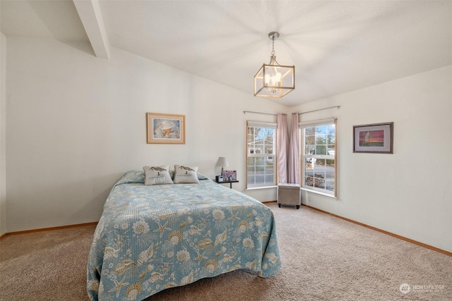 carpeted bedroom featuring beam ceiling and a chandelier