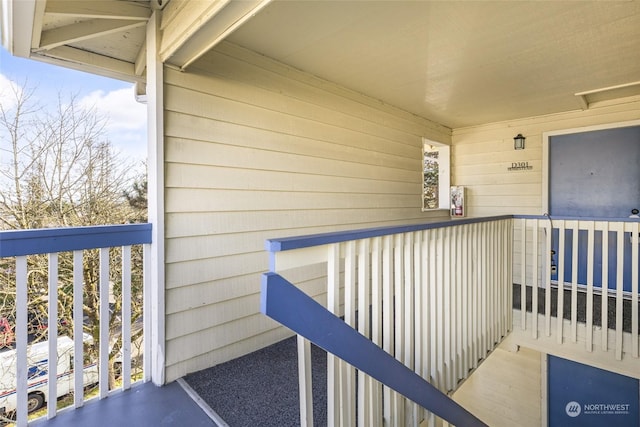 property entrance with a balcony