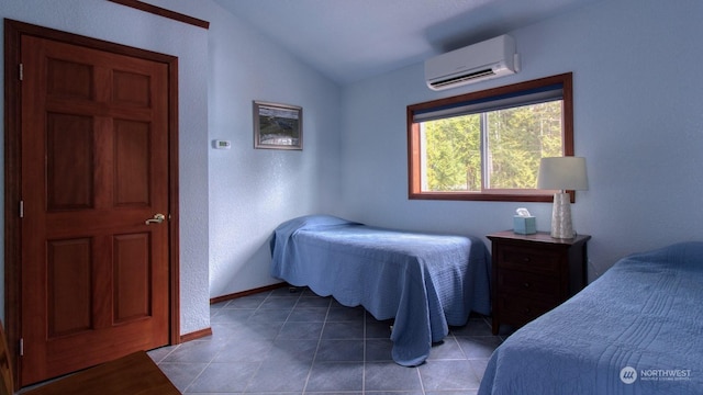 tiled bedroom featuring vaulted ceiling and an AC wall unit