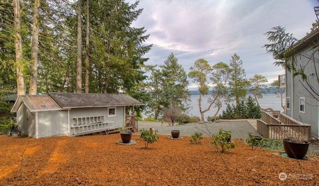 view of yard with a water view