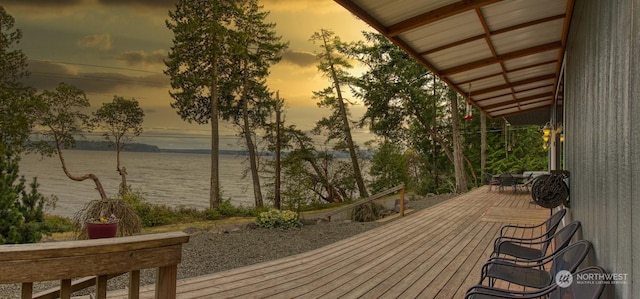 deck at dusk with a water view