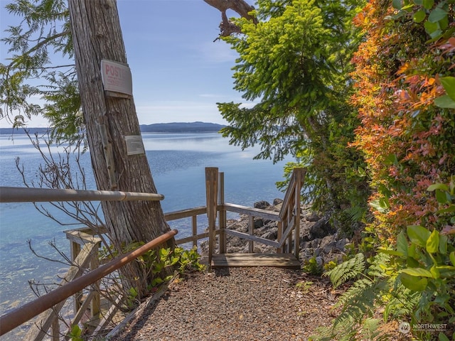 exterior space with a water view