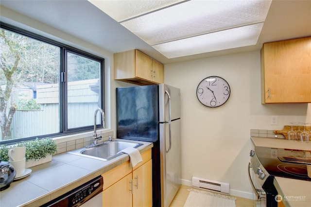 kitchen featuring sink, stainless steel appliances, tile countertops, a baseboard radiator, and light brown cabinets