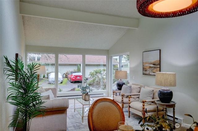 interior space featuring vaulted ceiling with beams, a textured ceiling, and a baseboard heating unit