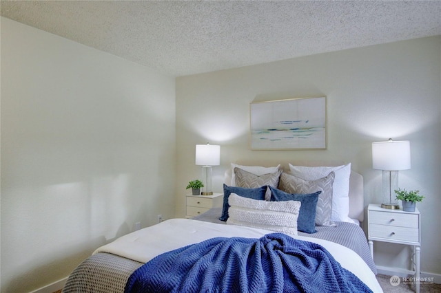 bedroom with a textured ceiling