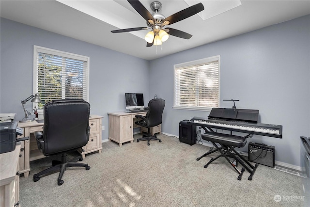 office area with ceiling fan and light colored carpet