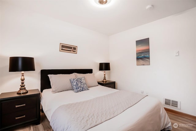 bedroom featuring light hardwood / wood-style flooring