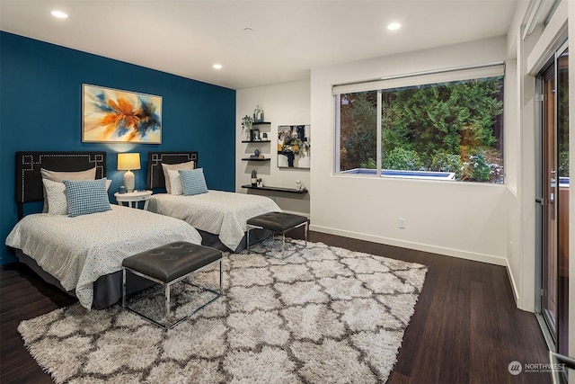 bedroom featuring recessed lighting, baseboards, and wood finished floors