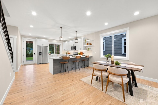 dining area featuring light hardwood / wood-style floors