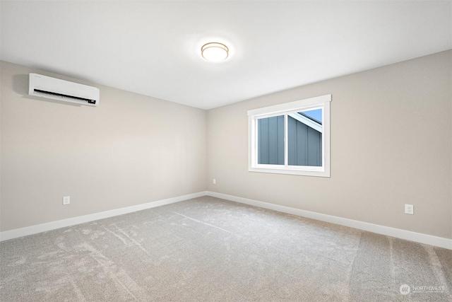 carpeted spare room with a wall mounted AC