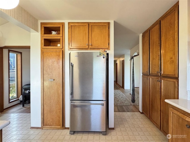 kitchen featuring stainless steel fridge