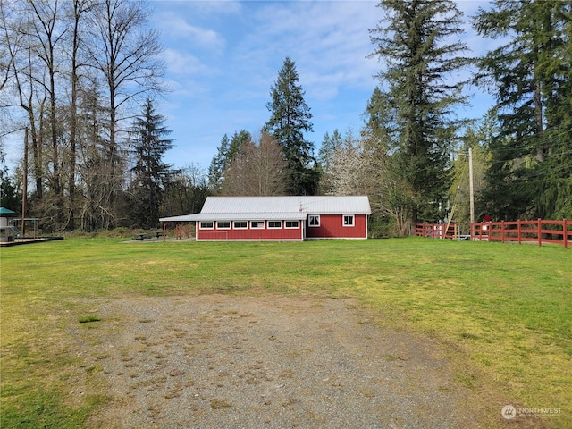 exterior space featuring an outbuilding