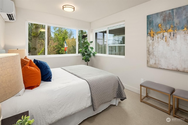 bedroom with carpet floors and a wall mounted air conditioner