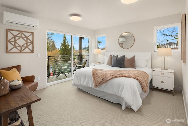 carpeted bedroom featuring access to exterior and an AC wall unit