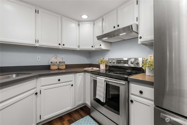 kitchen featuring sink, white cabinets, dark hardwood / wood-style floors, and appliances with stainless steel finishes