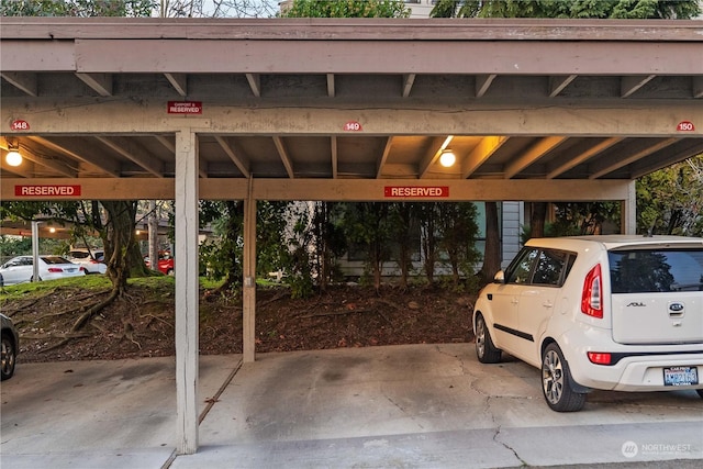 view of vehicle parking featuring a carport