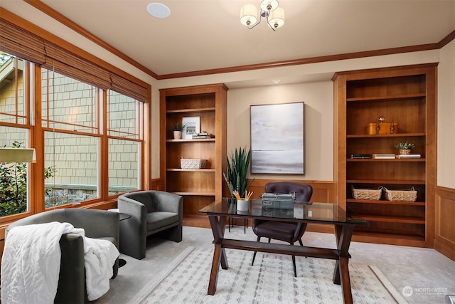 carpeted home office featuring built in features, a wealth of natural light, and crown molding