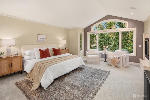 carpeted bedroom featuring vaulted ceiling