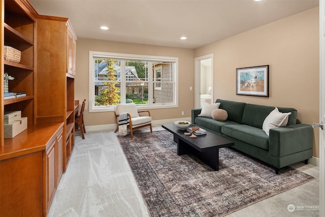 living room featuring light carpet