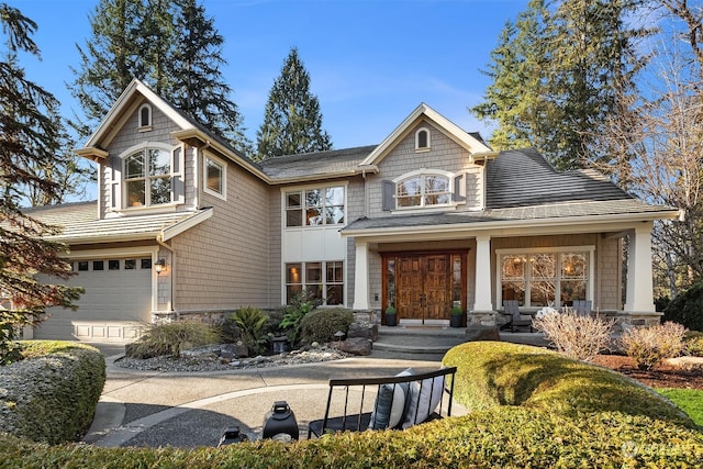 view of front of home featuring driveway and an attached garage