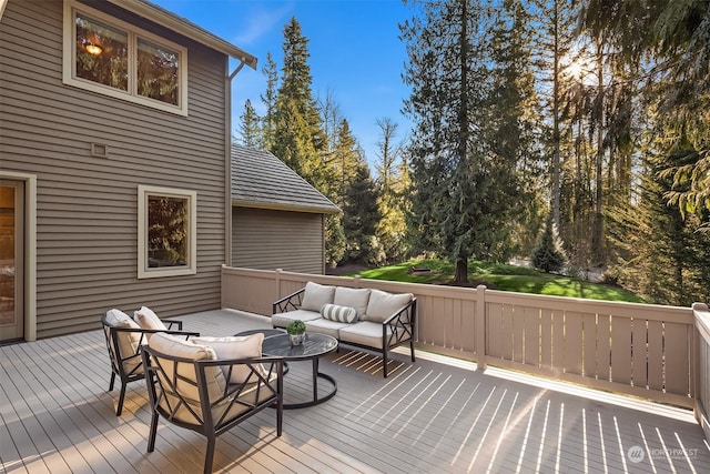 wooden deck featuring an outdoor hangout area