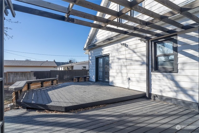 wooden terrace with a pergola