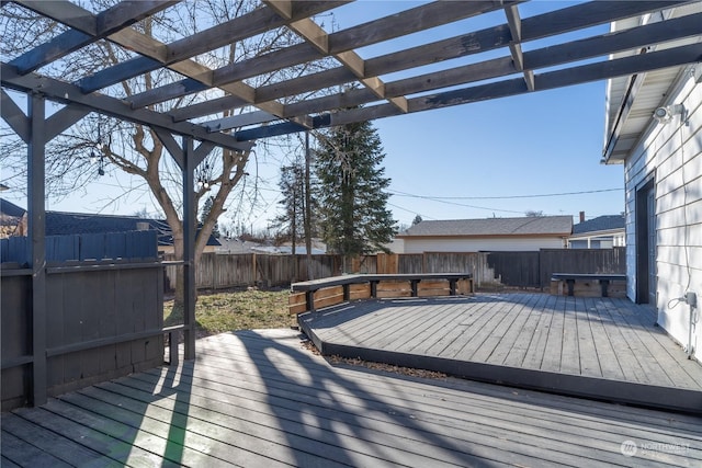 wooden deck featuring a pergola