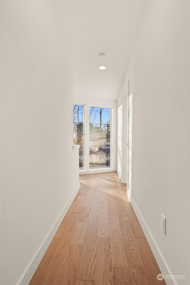 hallway with light wood-type flooring